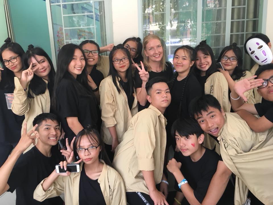 Teaching English in Vietnam classroom with local students