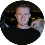 Portrait of a man smiling at night in Madrid