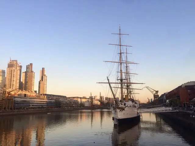 ship docked on the Buenos Aires waterfront at sunset