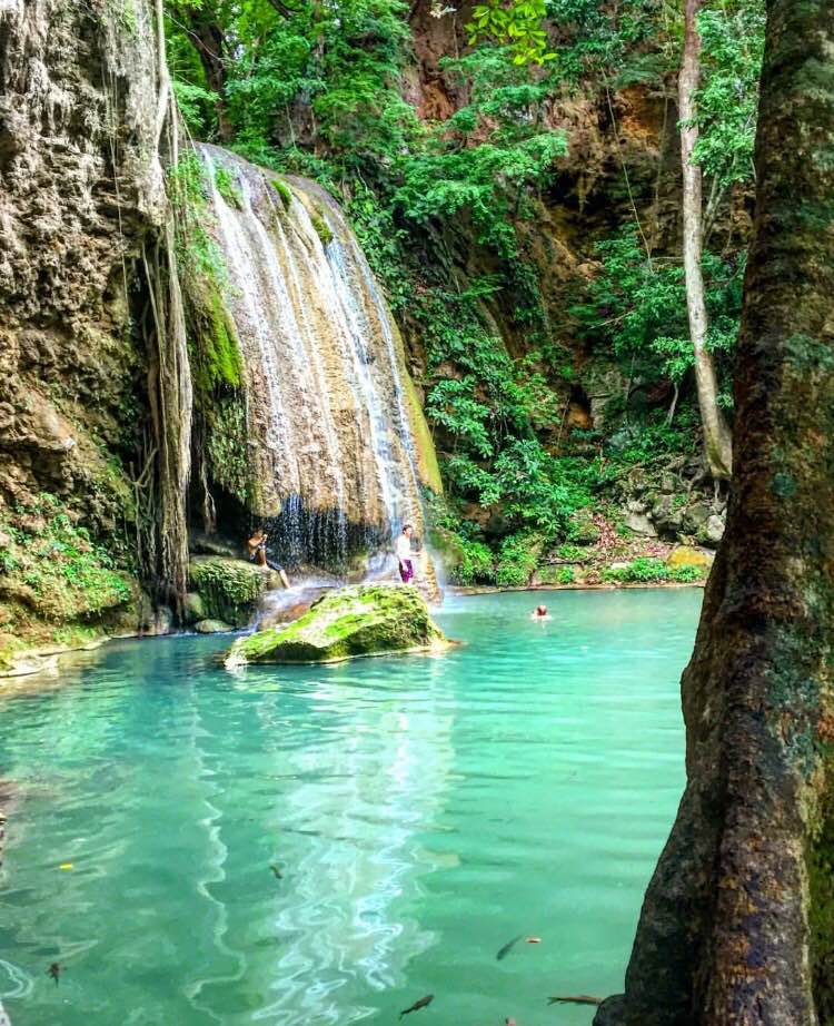 Erawan waterfall in Kanchanaburi with turquoise water and lush jungle surroundings