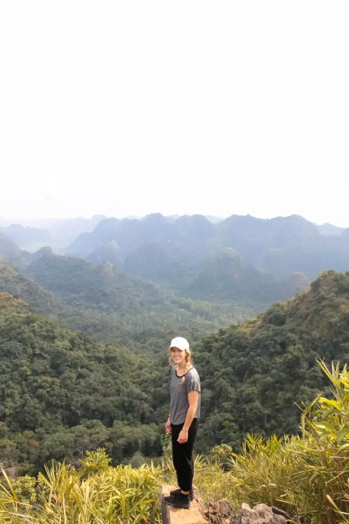 Teacher standing on mountain viewpoint in northern Vietnam