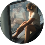 Portrait of a woman sitting by a window in Shanghai