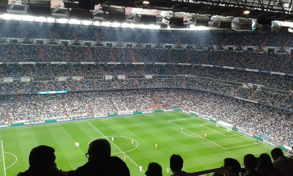 Football stadium in Madrid during live match with crowd
