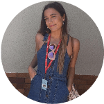 Portrait of a woman wearing a lanyard indoors