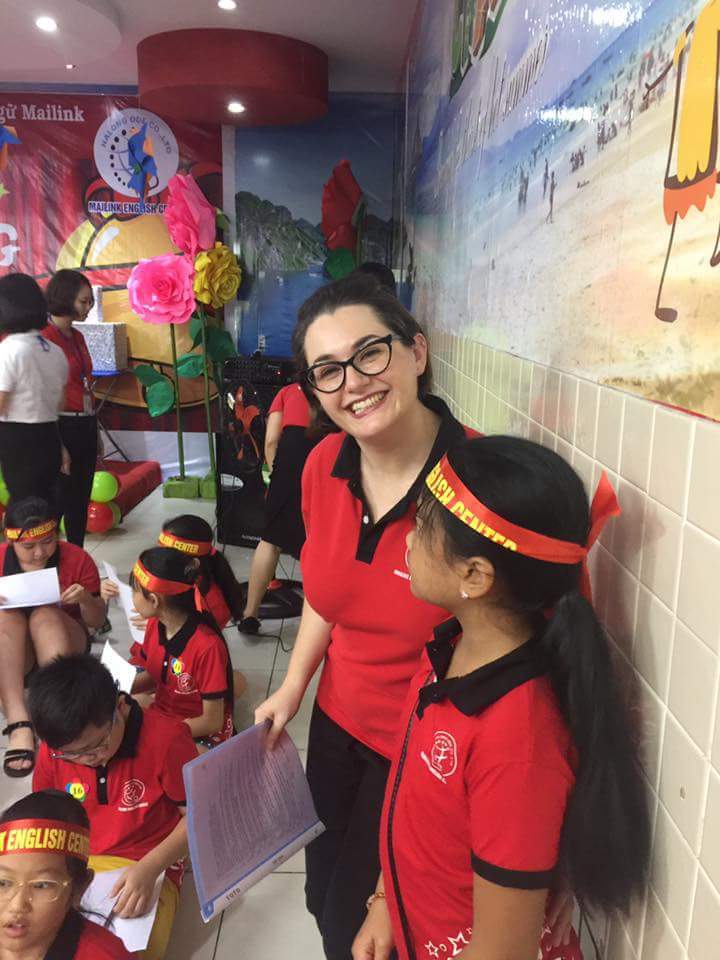 teaching English in Vietnam classroom with students