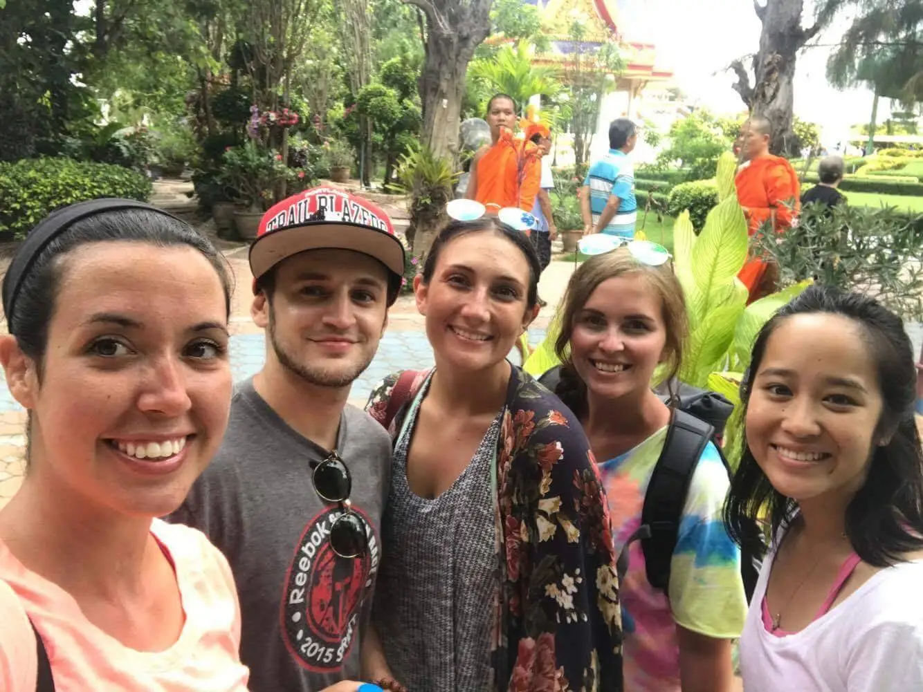Group of friends taking a selfie in a park in Thailand