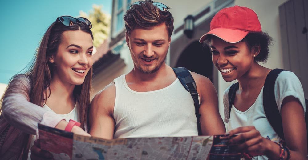 travellers reading a map